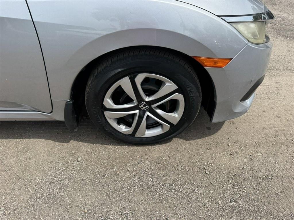 2016 Silver /Black Honda Civic (2HGFC2F50GH) with an 2.0l I-4 MPI Dohc 2.0l engine, Automatic transmission, located at 745 East Steele Rd., West Columbia, SC, 29170, (803) 755-9148, 33.927212, -81.148483- Photo#25