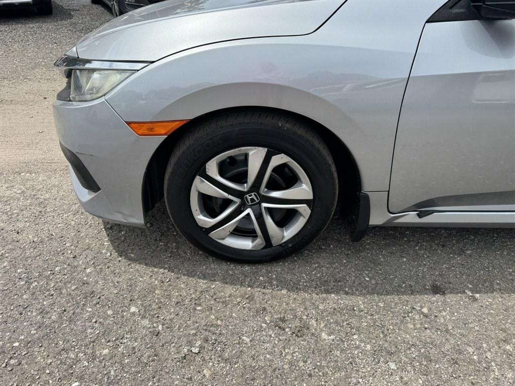 2016 Silver /Black Honda Civic (2HGFC2F50GH) with an 2.0l I-4 MPI Dohc 2.0l engine, Automatic transmission, located at 745 East Steele Rd., West Columbia, SC, 29170, (803) 755-9148, 33.927212, -81.148483- Photo#28