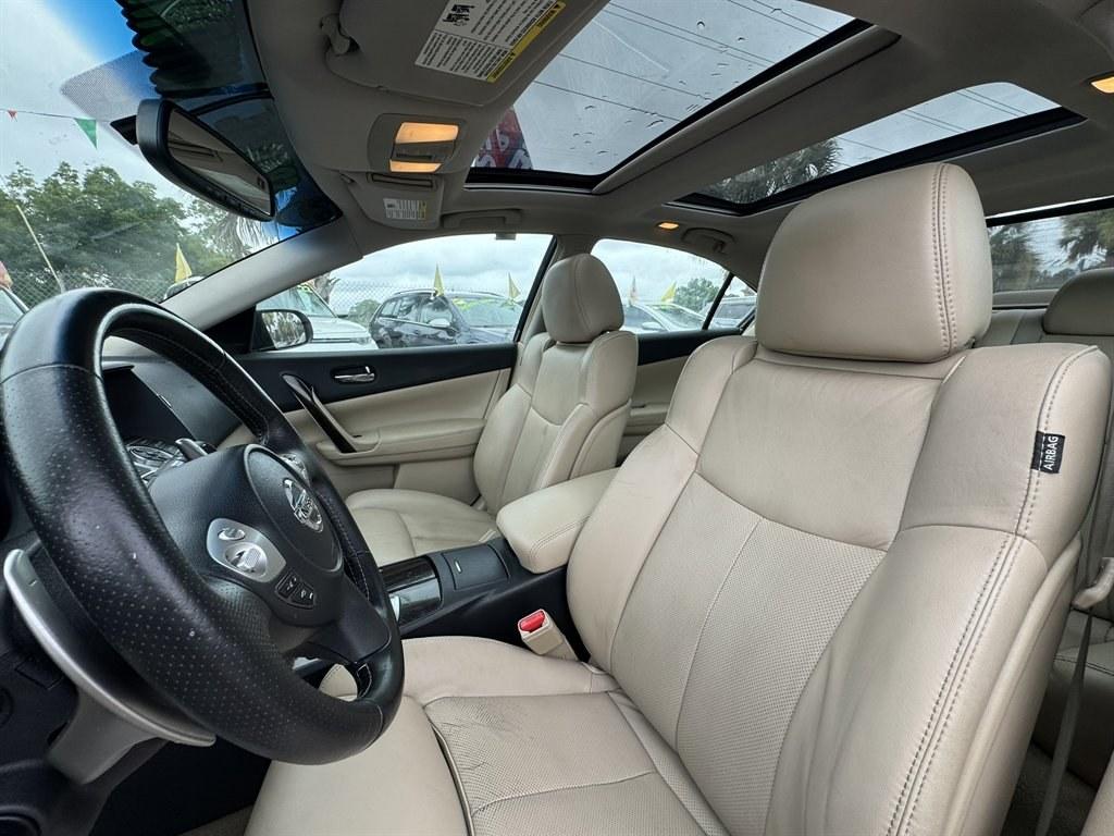 2014 Blue /Tan Nissan Maxima (1N4AA5AP7EC) with an 3.5l V6 Smpi Dohc Cvtcs 3 engine, Automatic transmission, located at 745 East Steele Rd., West Columbia, SC, 29170, (803) 755-9148, 33.927212, -81.148483- Photo#22
