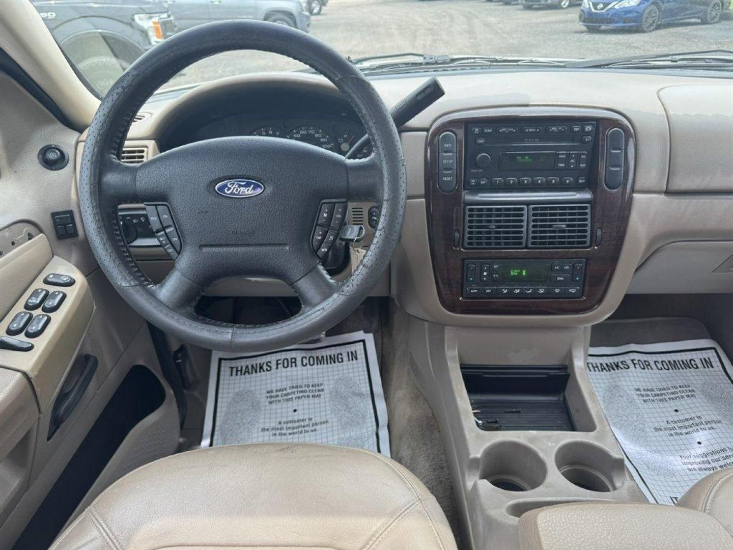 2004 White /Tan Ford Explorer (1FMDU65W54Z) with an 4.6l V8 EFI Sohc 4.6l engine, Automatic transmission, located at 745 East Steele Rd., West Columbia, SC, 29170, (803) 755-9148, 33.927212, -81.148483 - Special Internet Price! 2004 Ford Explorer with AM/FM radio, Cruise control, Sunroof, Leather interior, Keyless entry, 3rd row seating, Rear entertainment, Powered windows, Powered door locks, Plus more! - Photo#6