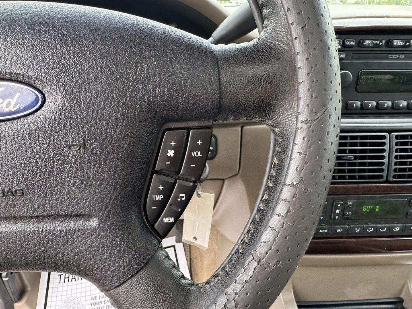 2004 White /Tan Ford Explorer (1FMDU65W54Z) with an 4.6l V8 EFI Sohc 4.6l engine, Automatic transmission, located at 745 East Steele Rd., West Columbia, SC, 29170, (803) 755-9148, 33.927212, -81.148483 - Special Internet Price! 2004 Ford Explorer with AM/FM radio, Cruise control, Sunroof, Leather interior, Keyless entry, 3rd row seating, Rear entertainment, Powered windows, Powered door locks, Plus more! - Photo#9