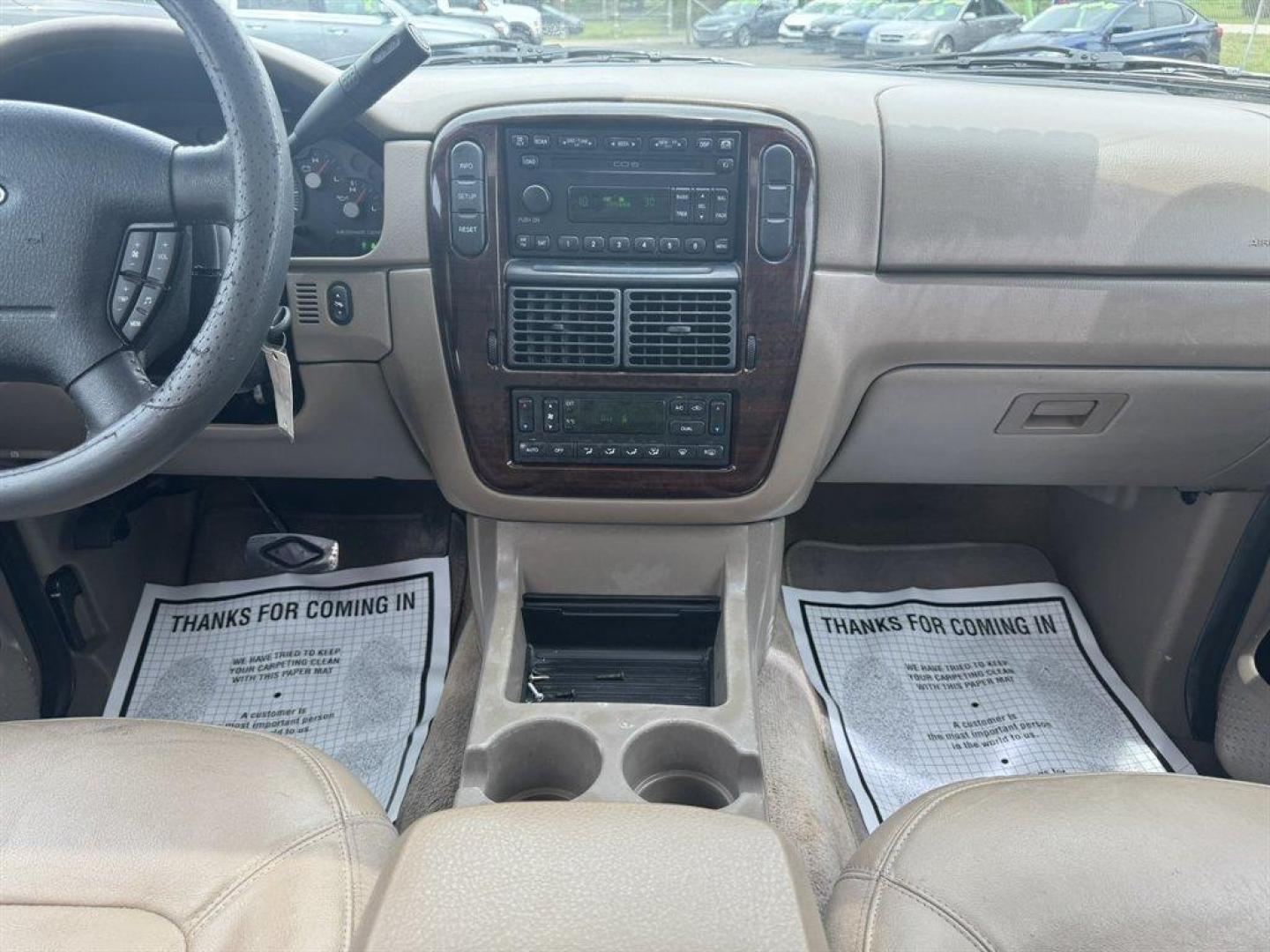 2004 White /Tan Ford Explorer (1FMDU65W54Z) with an 4.6l V8 EFI Sohc 4.6l engine, Automatic transmission, located at 745 East Steele Rd., West Columbia, SC, 29170, (803) 755-9148, 33.927212, -81.148483 - Special Internet Price! 2004 Ford Explorer with AM/FM radio, Cruise control, Sunroof, Leather interior, Keyless entry, 3rd row seating, Rear entertainment, Powered windows, Powered door locks, Plus more! - Photo#11