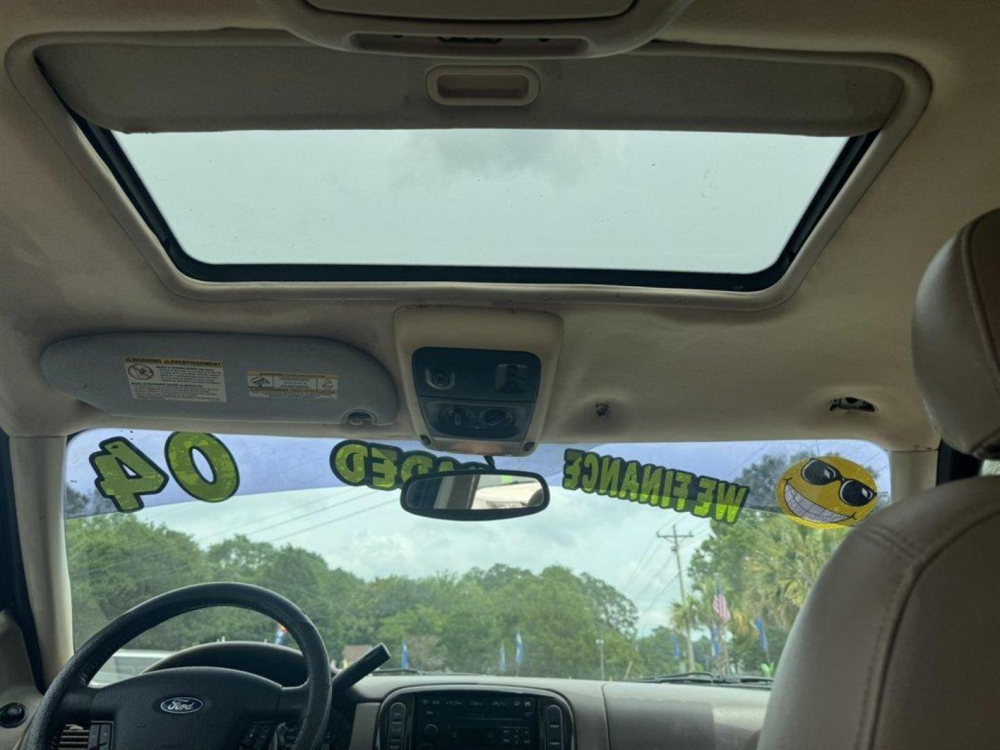 2004 White /Tan Ford Explorer (1FMDU65W54Z) with an 4.6l V8 EFI Sohc 4.6l engine, Automatic transmission, located at 745 East Steele Rd., West Columbia, SC, 29170, (803) 755-9148, 33.927212, -81.148483 - Special Internet Price! 2004 Ford Explorer with AM/FM radio, Cruise control, Sunroof, Leather interior, Keyless entry, 3rd row seating, Rear entertainment, Powered windows, Powered door locks, Plus more! - Photo#14