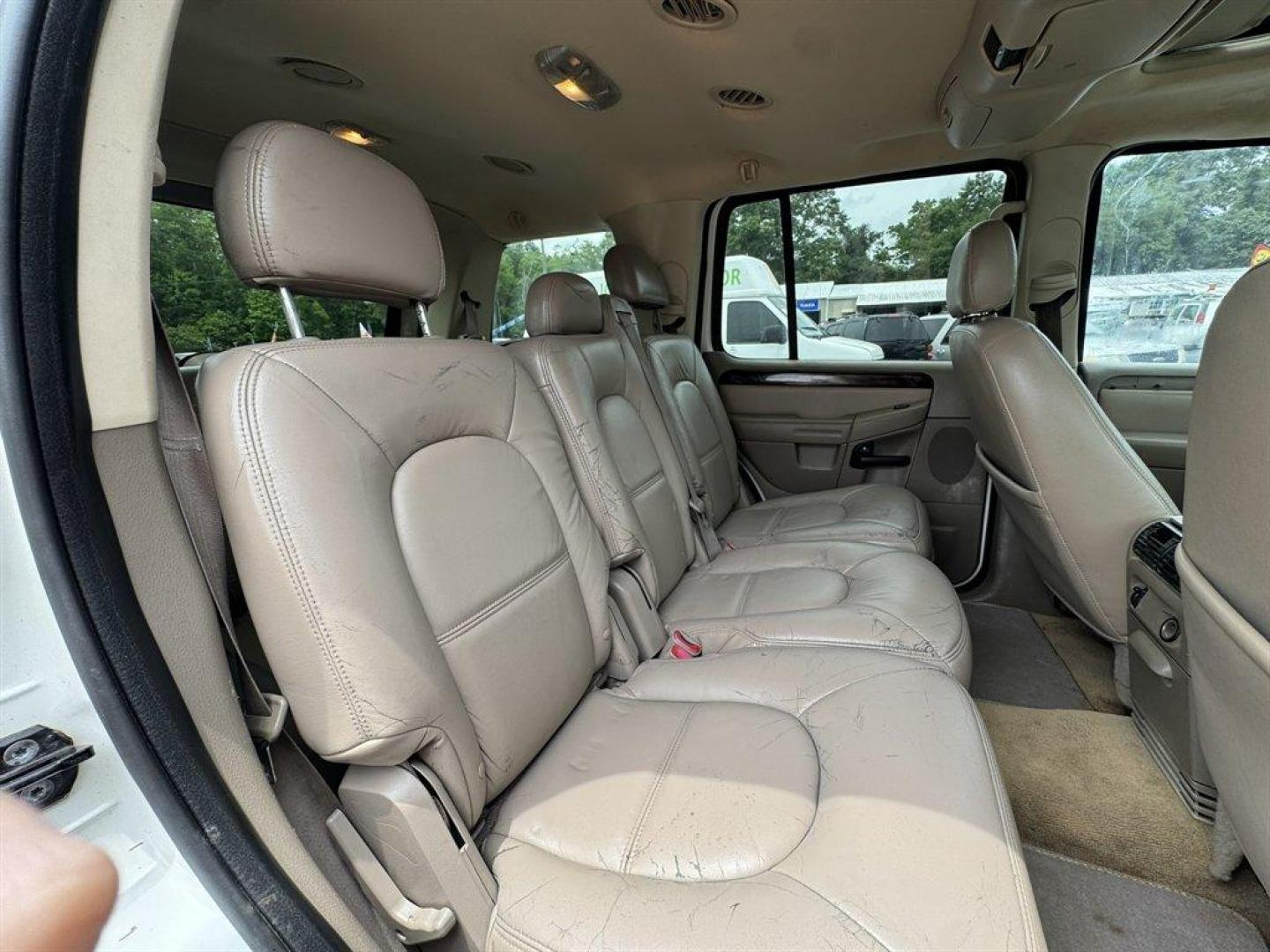 2004 White /Tan Ford Explorer (1FMDU65W54Z) with an 4.6l V8 EFI Sohc 4.6l engine, Automatic transmission, located at 745 East Steele Rd., West Columbia, SC, 29170, (803) 755-9148, 33.927212, -81.148483 - Special Internet Price! 2004 Ford Explorer with AM/FM radio, Cruise control, Sunroof, Leather interior, Keyless entry, 3rd row seating, Rear entertainment, Powered windows, Powered door locks, Plus more! - Photo#24