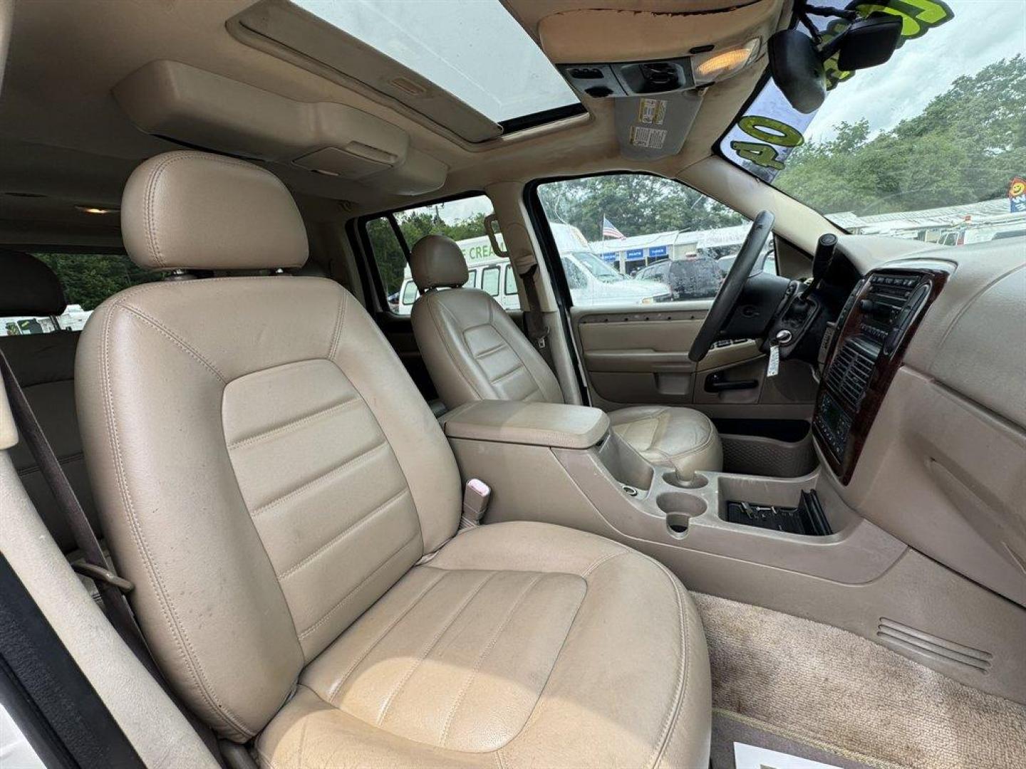 2004 White /Tan Ford Explorer (1FMDU65W54Z) with an 4.6l V8 EFI Sohc 4.6l engine, Automatic transmission, located at 745 East Steele Rd., West Columbia, SC, 29170, (803) 755-9148, 33.927212, -81.148483 - Special Internet Price! 2004 Ford Explorer with AM/FM radio, Cruise control, Sunroof, Leather interior, Keyless entry, 3rd row seating, Rear entertainment, Powered windows, Powered door locks, Plus more! - Photo#26