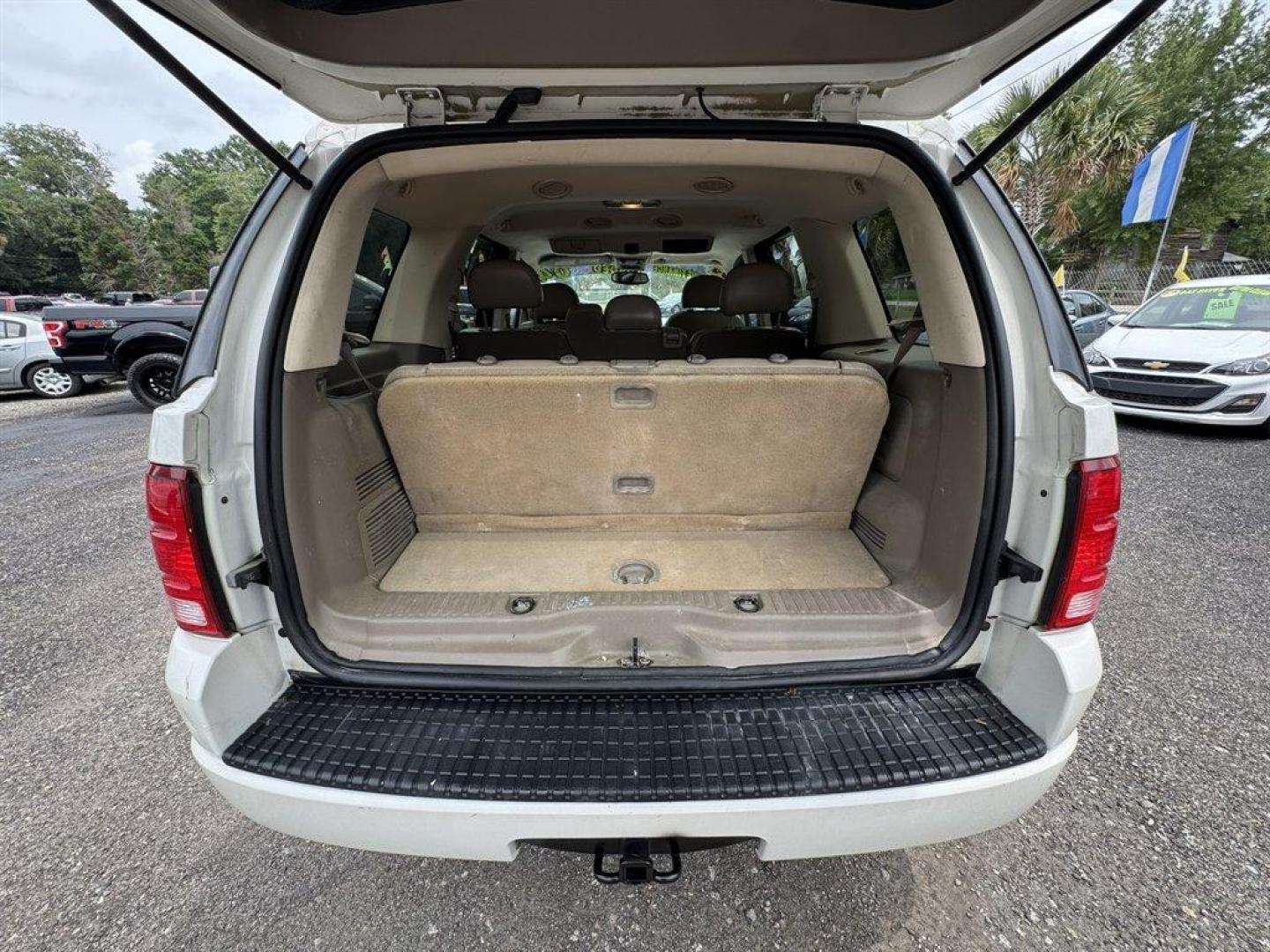 2004 White /Tan Ford Explorer (1FMDU65W54Z) with an 4.6l V8 EFI Sohc 4.6l engine, Automatic transmission, located at 745 East Steele Rd., West Columbia, SC, 29170, (803) 755-9148, 33.927212, -81.148483 - Special Internet Price! 2004 Ford Explorer with AM/FM radio, Cruise control, Sunroof, Leather interior, Keyless entry, 3rd row seating, Rear entertainment, Powered windows, Powered door locks, Plus more! - Photo#27