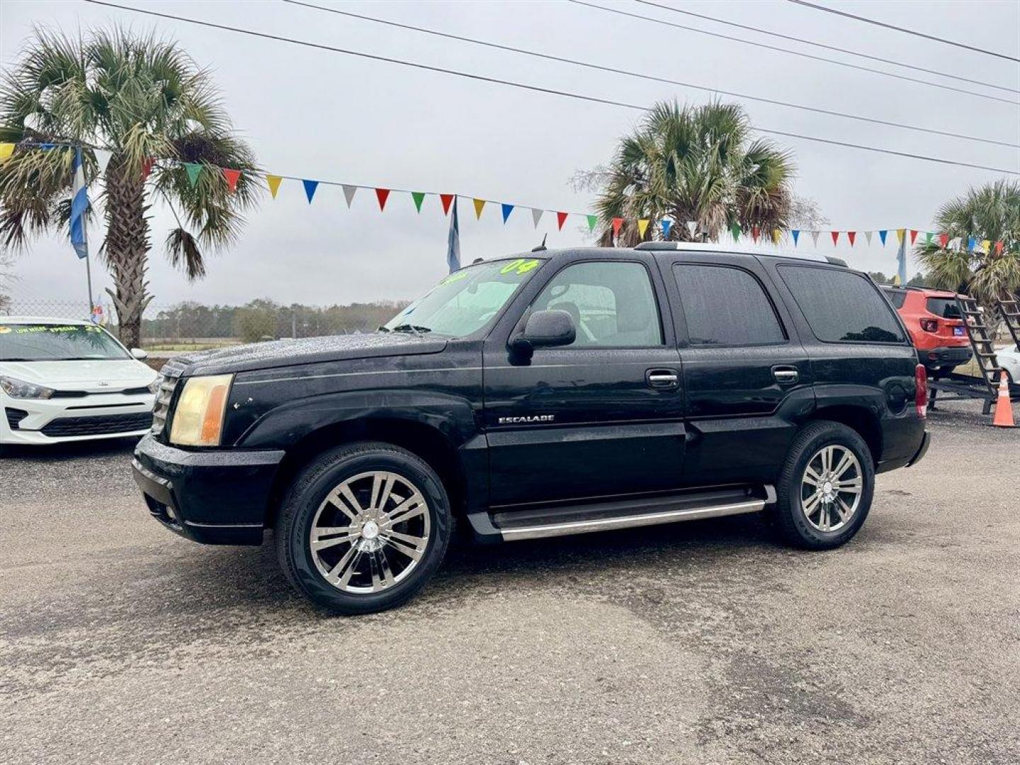 2004 Black /Grey Cadillac Escalade (1GYEC63T04R) with an 5.3l V8 SFI OHV 5.3l engine, Automatic transmission, located at 745 East Steele Rd., West Columbia, SC, 29170, (803) 755-9148, 33.927212, -81.148483 - Photo#0