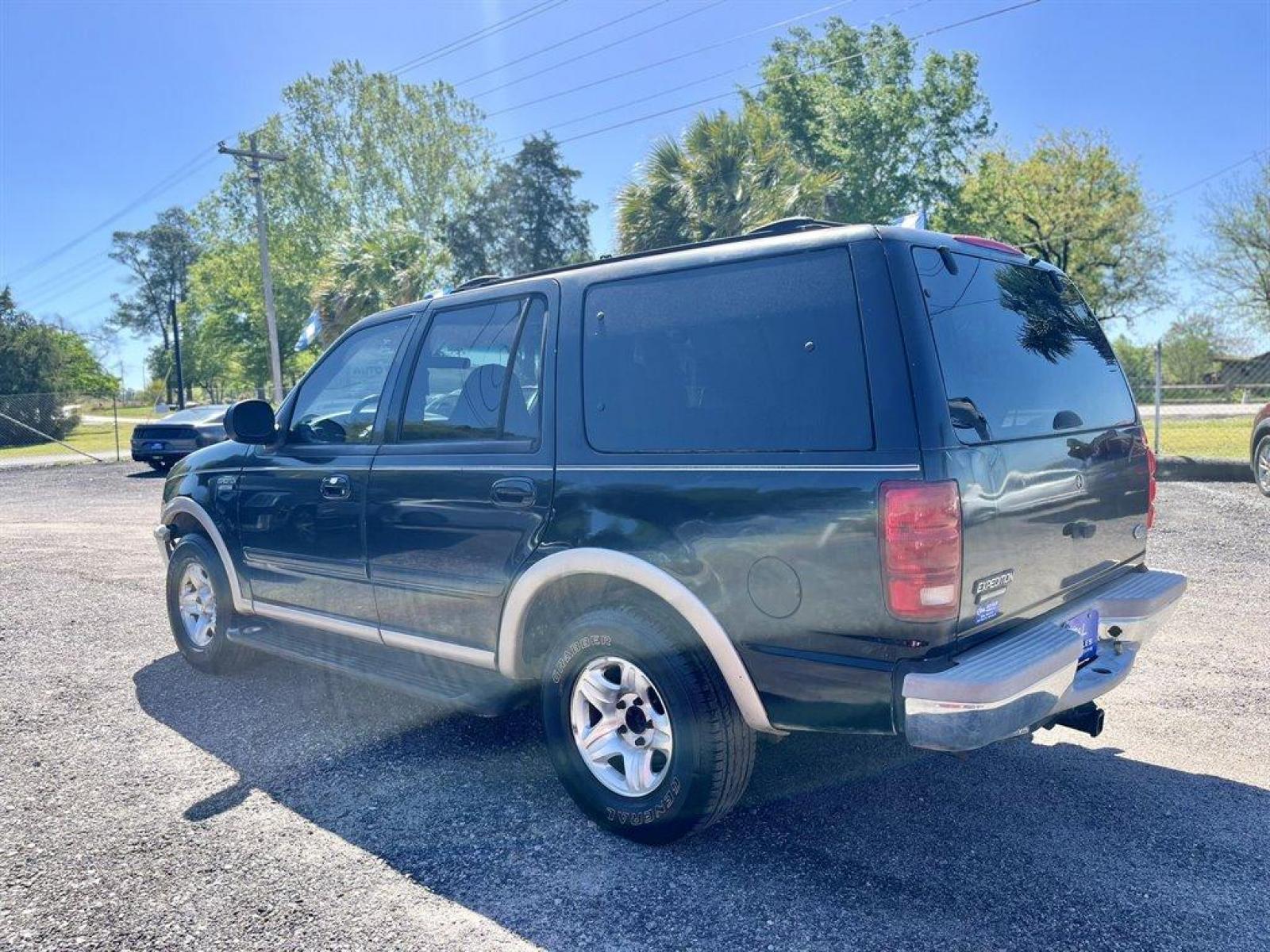 1998 Black /Tan Ford Expedition (1FMRU17L1WL) with an 5.4l V8 EFI 5.4l engine, Automatic transmission, located at 745 East Steele Rd., West Columbia, SC, 29170, (803) 755-9148, 33.927212, -81.148483 - Special Internet Price! 1998 Ford Expedition Eddie Bauer with AM/FM radio, Cruise control, Air conditioning, Leather interior, Powered driver seat, 3rd row bench seat, 2nd row bench seat, Rear air conditioning, Powered windows, Powered door locks, Plus more! - Photo #1