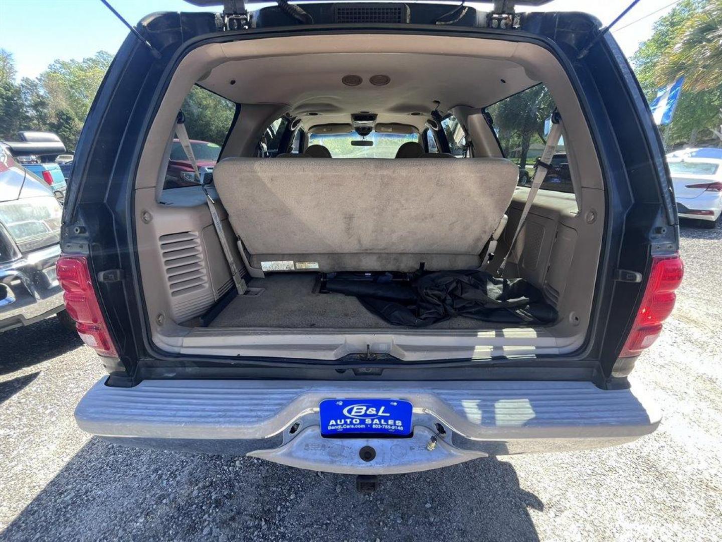 1998 Black /Tan Ford Expedition (1FMRU17L1WL) with an 5.4l V8 EFI 5.4l engine, Automatic transmission, located at 745 East Steele Rd., West Columbia, SC, 29170, (803) 755-9148, 33.927212, -81.148483 - Special Internet Price! 1998 Ford Expedition Eddie Bauer with AM/FM radio, Cruise control, Air conditioning, Leather interior, Powered driver seat, 3rd row bench seat, 2nd row bench seat, Rear air conditioning, Powered windows, Powered door locks, Plus more! - Photo#26