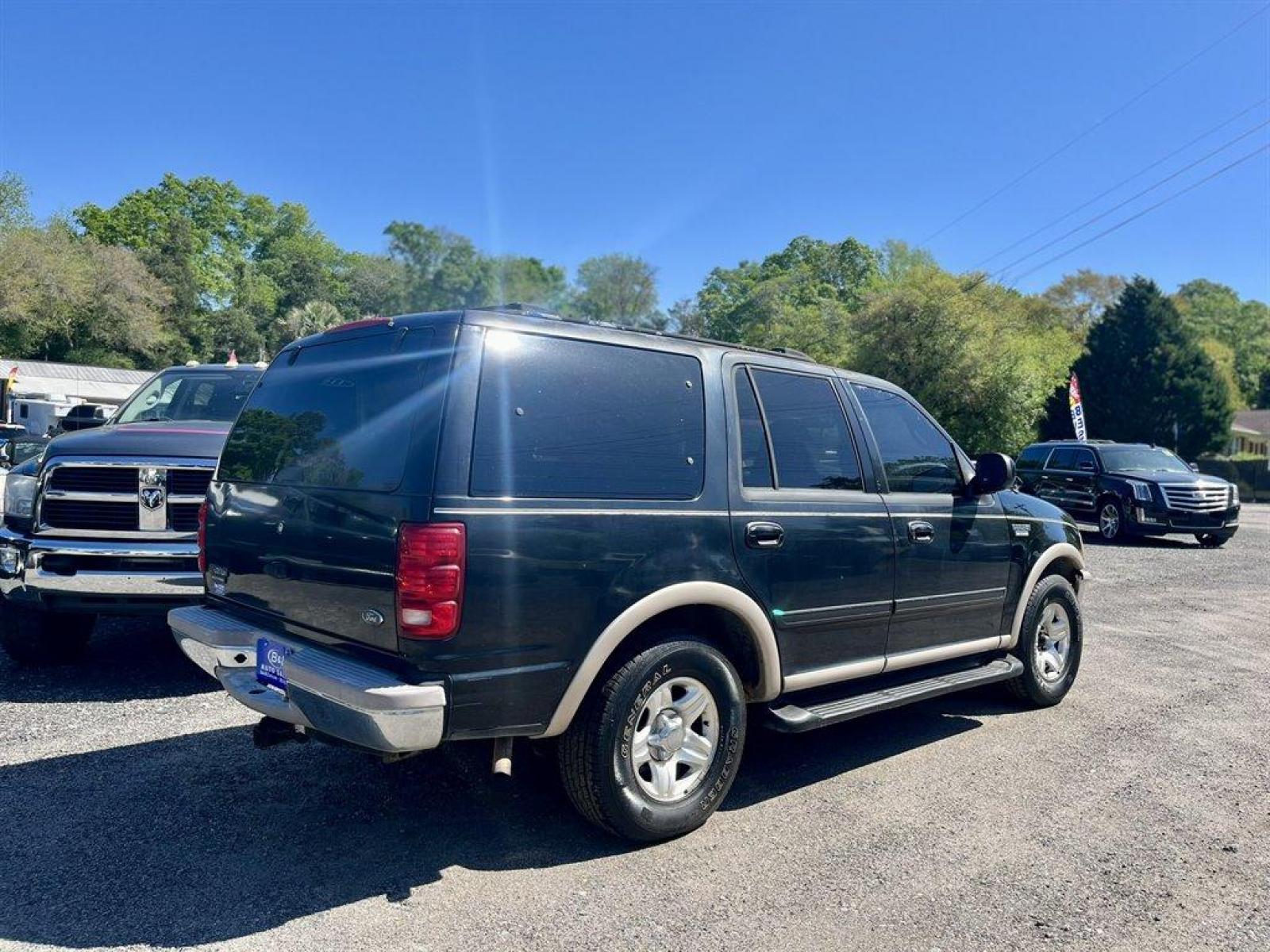 1998 Black /Tan Ford Expedition (1FMRU17L1WL) with an 5.4l V8 EFI 5.4l engine, Automatic transmission, located at 745 East Steele Rd., West Columbia, SC, 29170, (803) 755-9148, 33.927212, -81.148483 - Special Internet Price! 1998 Ford Expedition Eddie Bauer with AM/FM radio, Cruise control, Air conditioning, Leather interior, Powered driver seat, 3rd row bench seat, 2nd row bench seat, Rear air conditioning, Powered windows, Powered door locks, Plus more! - Photo #2