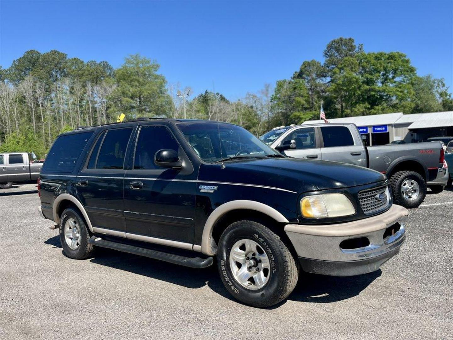 1998 Black /Tan Ford Expedition (1FMRU17L1WL) with an 5.4l V8 EFI 5.4l engine, Automatic transmission, located at 745 East Steele Rd., West Columbia, SC, 29170, (803) 755-9148, 33.927212, -81.148483 - Special Internet Price! 1998 Ford Expedition Eddie Bauer with AM/FM radio, Cruise control, Air conditioning, Leather interior, Powered driver seat, 3rd row bench seat, 2nd row bench seat, Rear air conditioning, Powered windows, Powered door locks, Plus more! - Photo#3