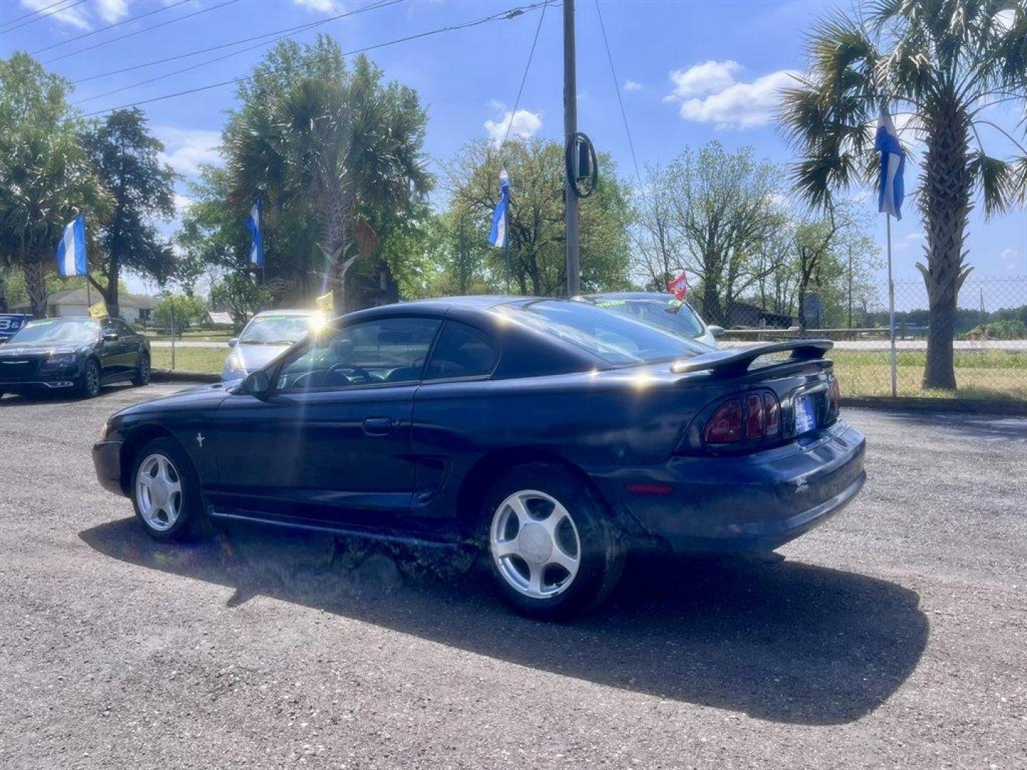 1997 Blue /Black Ford Mustang (1FALP404XVF) with an 3.8l V6 EFI 3.8l engine, Auto transmission, located at 745 East Steele Rd., West Columbia, SC, 29170, (803) 755-9148, 33.927212, -81.148483 - Special Internet Price! 1997 Ford Mustang - Photo#5