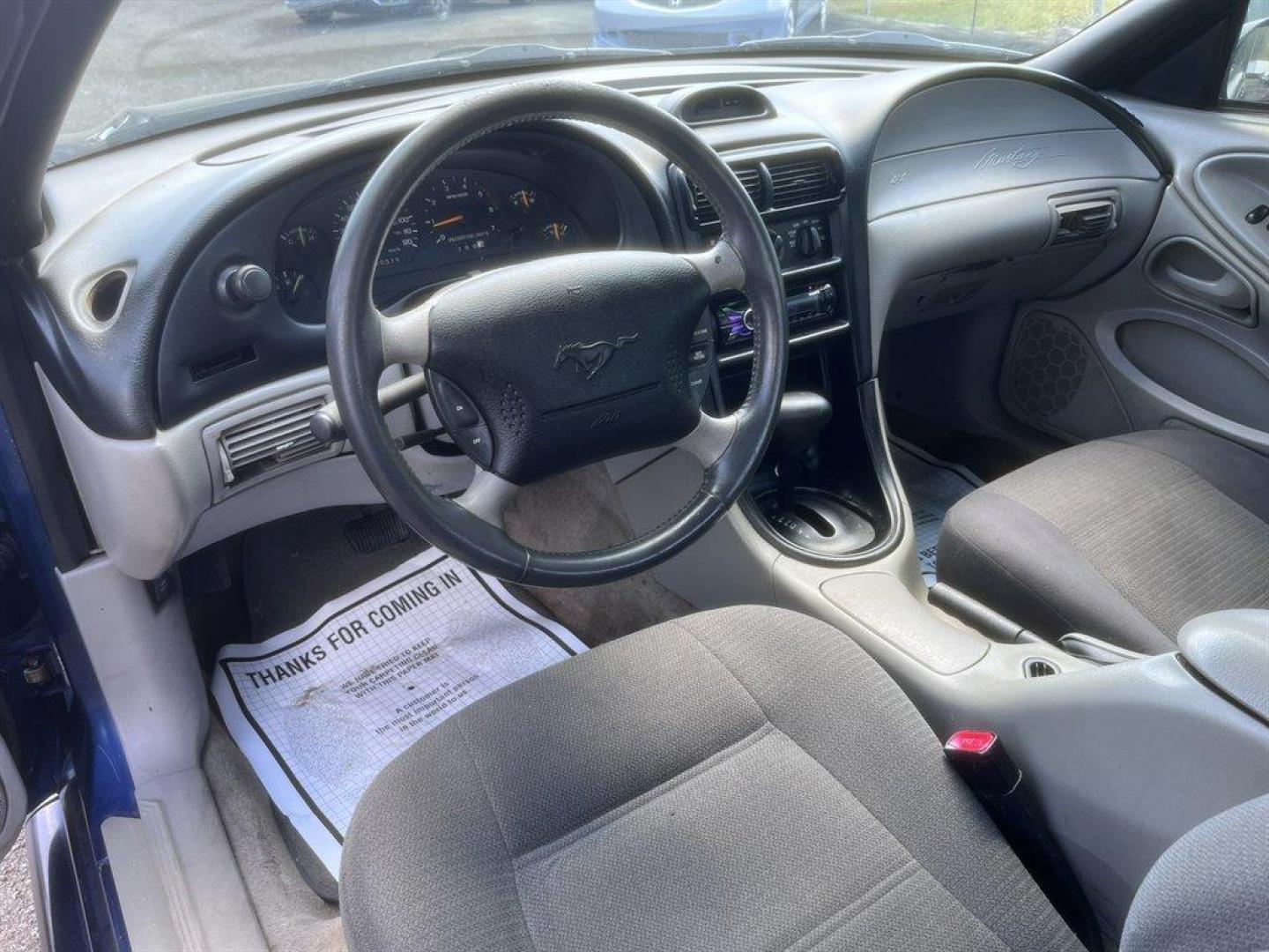 1997 Blue /Black Ford Mustang (1FALP404XVF) with an 3.8l V6 EFI 3.8l engine, Auto transmission, located at 745 East Steele Rd., West Columbia, SC, 29170, (803) 755-9148, 33.927212, -81.148483 - Special Internet Price! 1997 Ford Mustang - Photo#6