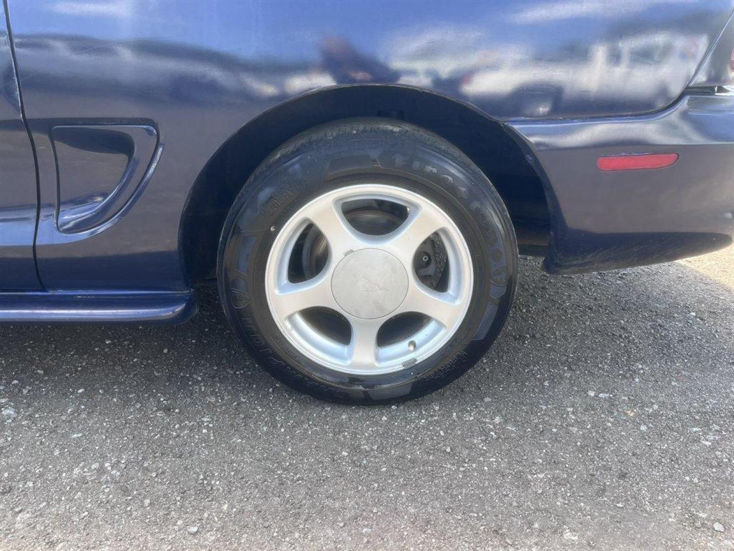 1997 Blue /Black Ford Mustang (1FALP404XVF) with an 3.8l V6 EFI 3.8l engine, Auto transmission, located at 745 East Steele Rd., West Columbia, SC, 29170, (803) 755-9148, 33.927212, -81.148483 - Special Internet Price! 1997 Ford Mustang - Photo#18