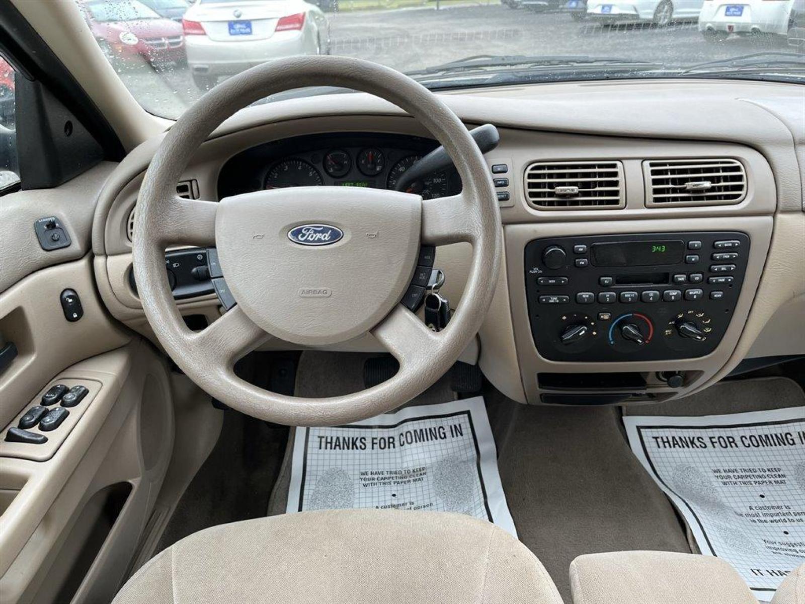 2007 Silver /Beige Ford Taurus (1FAFP53U37A) with an 3.0l V6 SFI 3.0l engine, Auto transmission, located at 745 East Steele Rd., West Columbia, SC, 29170, (803) 755-9148, 33.927212, -81.148483 - Special Internet Price! 2007 Ford Taurus with cloth seats that seat up to 6, powered windows, powered locks, cold a/c and hot heat, plus more! - Photo #4