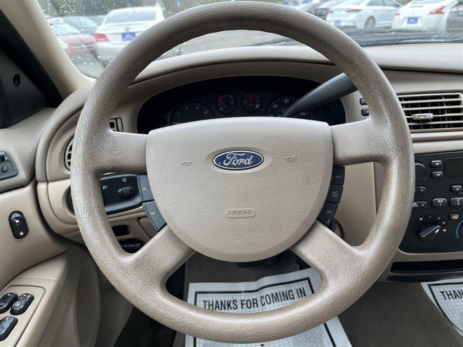 2007 Silver /Beige Ford Taurus SE (1FAFP53U37A) with an 3.0l V6 SFI 3.0l engine, Auto transmission, located at 745 East Steele Rd., West Columbia, SC, 29170, (803) 755-9148, 33.927212, -81.148483 - Special Internet Price! 2007 Ford Taurus with cloth seats that seat up to 6, powered windows, powered locks, cold a/c and hot heat, plus more! - Photo #5